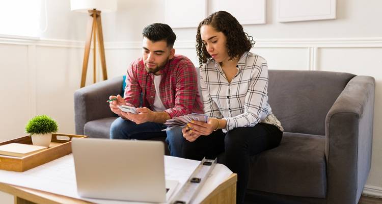 couple with calculator