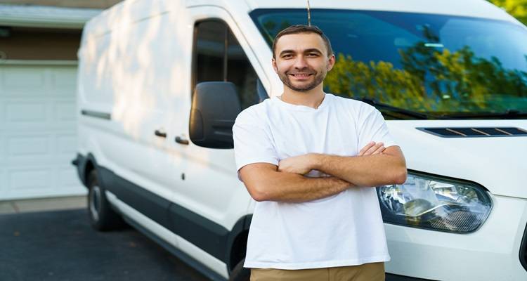 person stood in front of van