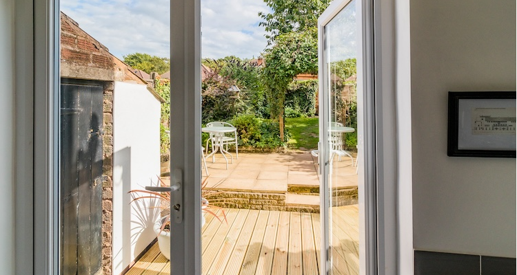 french door installation with a view looking out into a garden