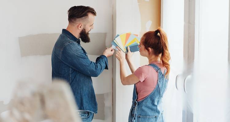 couple choosing paint colours