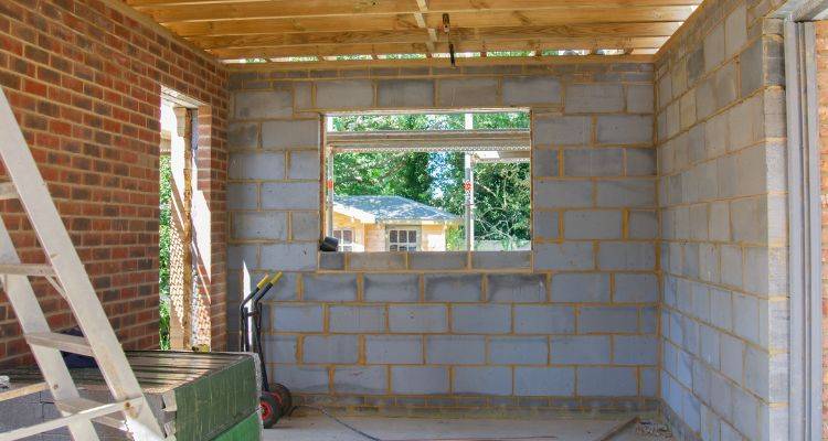 garage being converted into bedroom