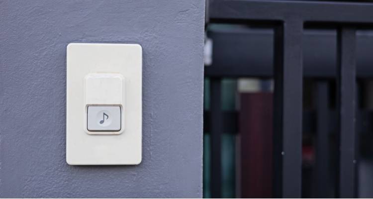 installed doorbell on wall