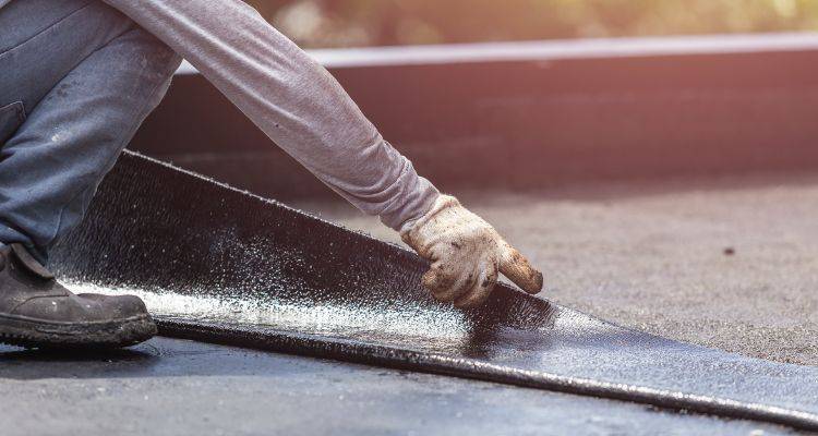 roofer installing new flat roof