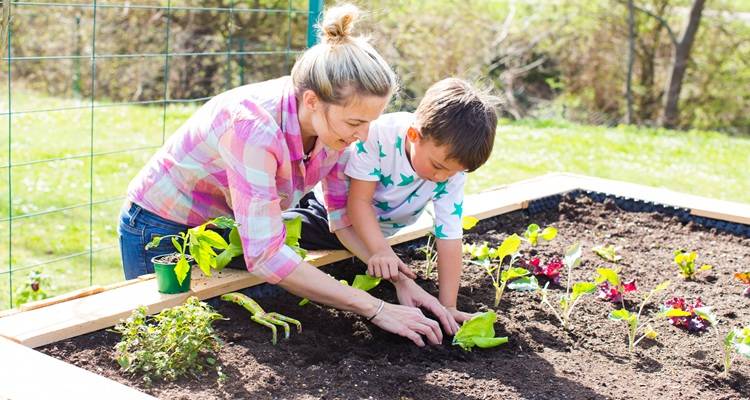 Mum and kid gardening