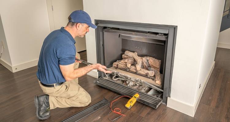 man in front of Gas fire