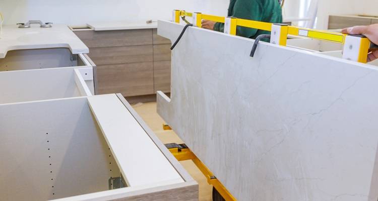 granite worktop being fitted