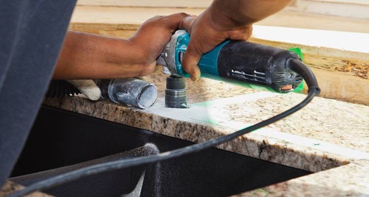 granite worktop being cut out