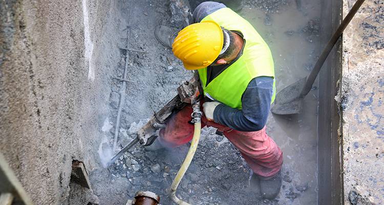 person using jackhammer