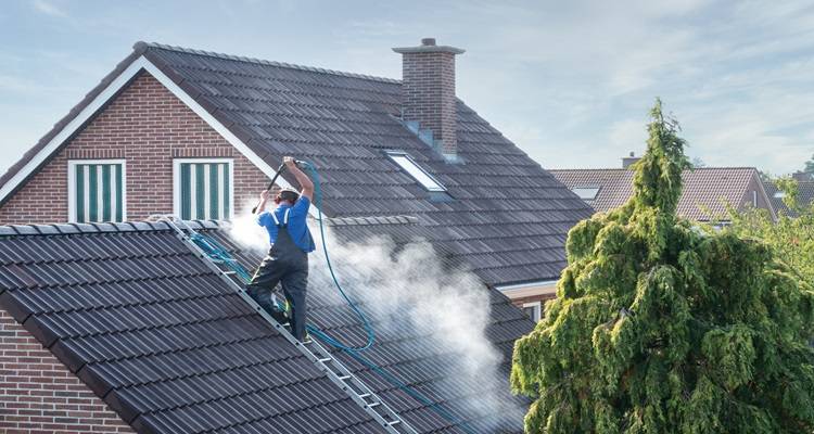 Pressure washing roof