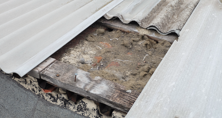 old damaged asbestos-cement roof