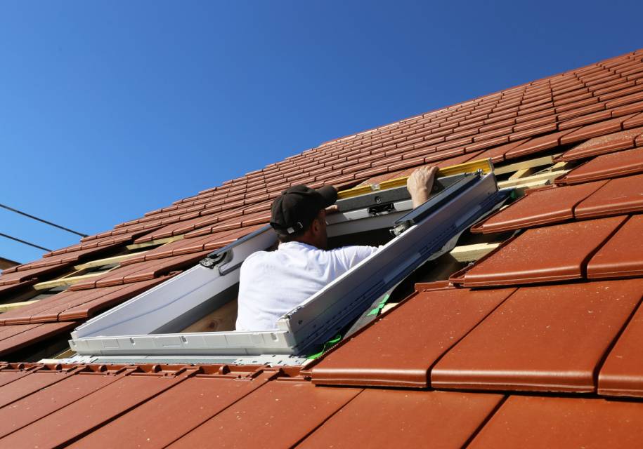 roofer fitting skylight