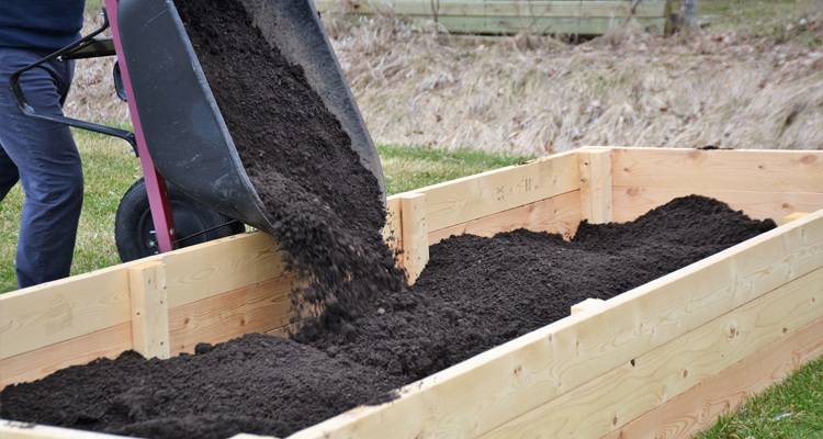 raised bed being filled