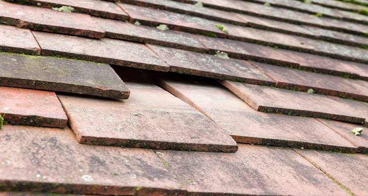 slipped roof tiles